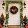 A realistic cedar garland with flexible branch design draped across a white wall with a wreath and decorative lanterns.