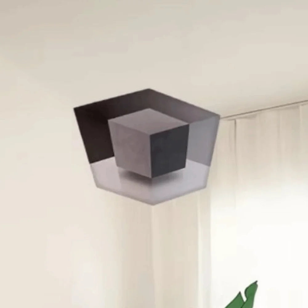 A 3D optical illusion corner wall decal featuring an impossible maze cube pattern in shades of gray and black.