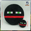 A black plush doll with white and green eyes and a red stripe, shown against a white background.