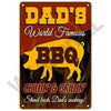 A vintage metal sign featuring a yellow silhouette of a bison with the text Dad's World Famous BBQ Chillin' & Grillin' Stand 
