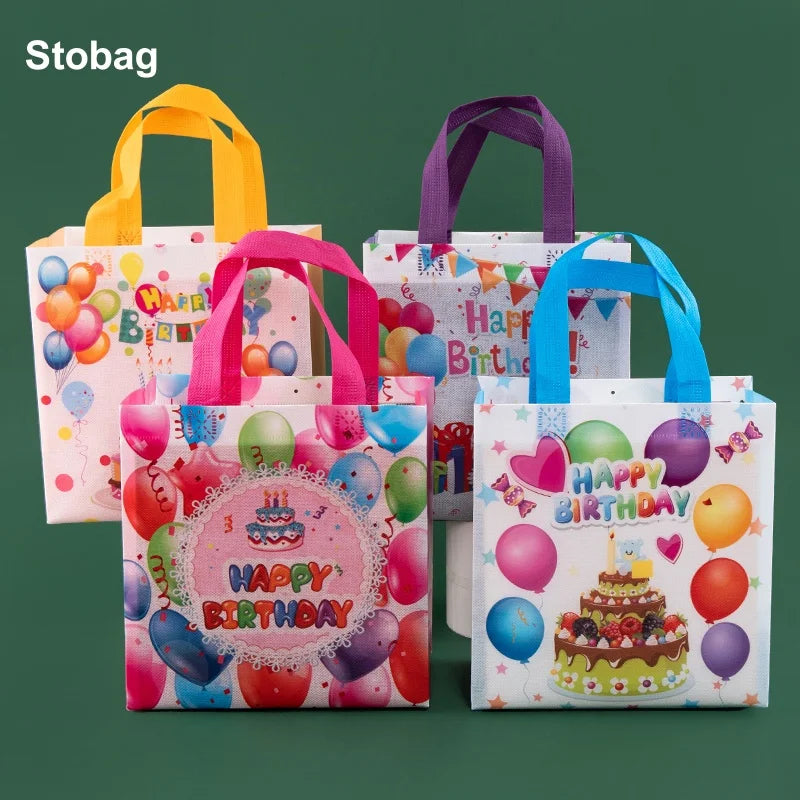A set of colorful reusable happy birthday gift bags in pink, purple, and yellow for celebrations.