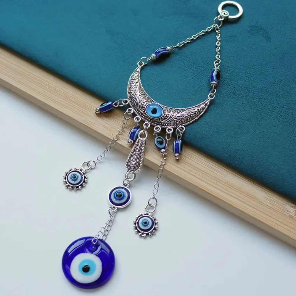 Silver and blue Turkish Blue Evil Eye Hamsa Hand Wall Hanging Amulet with dangling charms
