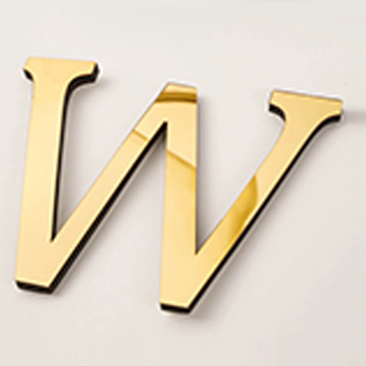 Gold acrylic mirror letter W wall sticker for decorative purposes