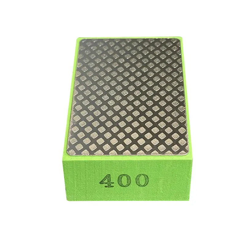 A rectangular green polishing pad with a diamond pattern on top, labeled 400.