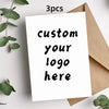A white greeting card with black text that reads custom your logo here, placed on a brown kraft paper envelope.
