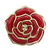 A glossy red rose-shaped handbag hook with gold trim.