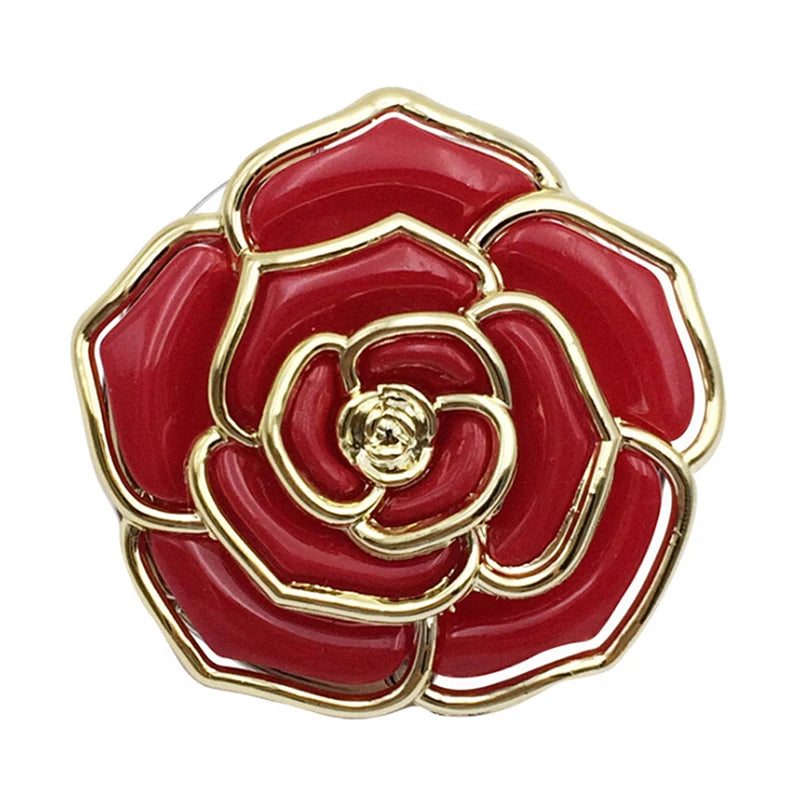 A glossy red rose-shaped handbag hook with gold trim.