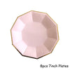 Eight 7-inch pink disposable plates with gold edges