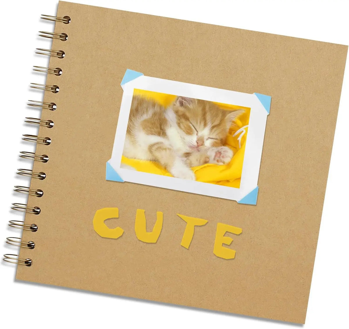 A brown scrapbook page features a photo of a sleeping kitten in a yellow frame.
