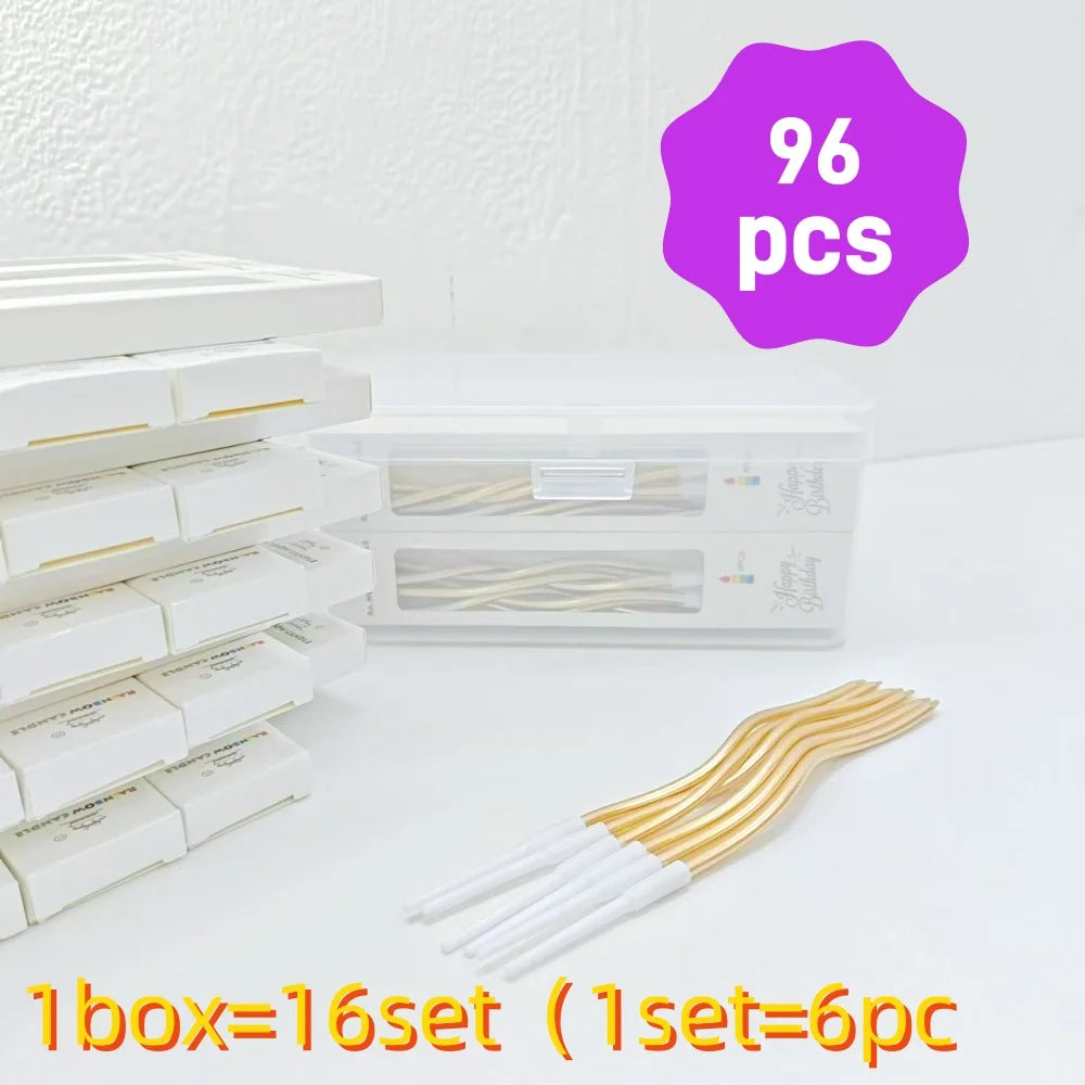 A box of 16 sets of spiral birthday cake candles with star toppers, showing the product packaging and individual candles.