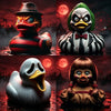 A set of three horror movie duck resin figurines featuring different expressions and styles against a dark, moody background.