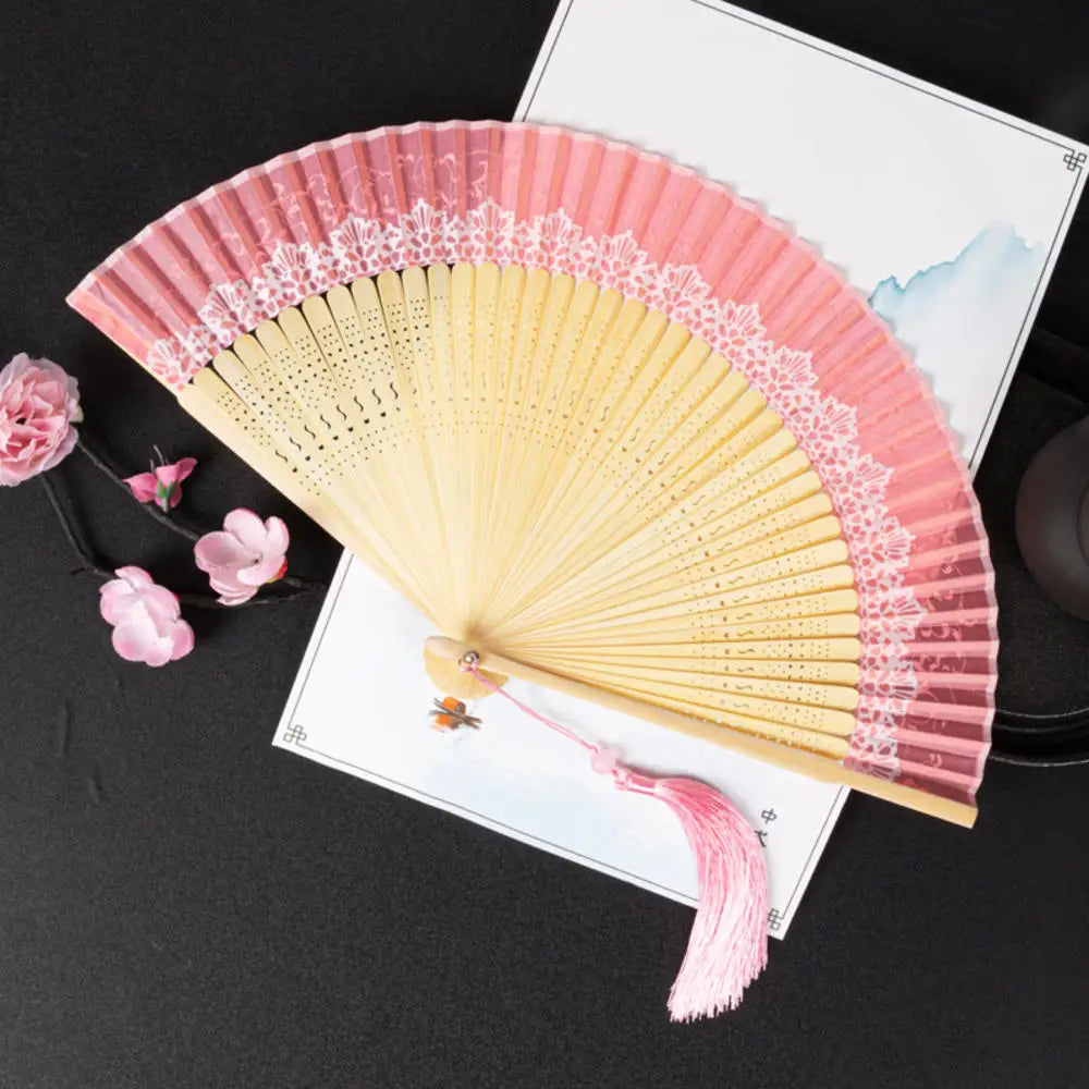 Traditional Bamboo Folding Fan with Solid Color Design