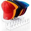 Acrylic storage rack displaying a row of colorful fabric caps.