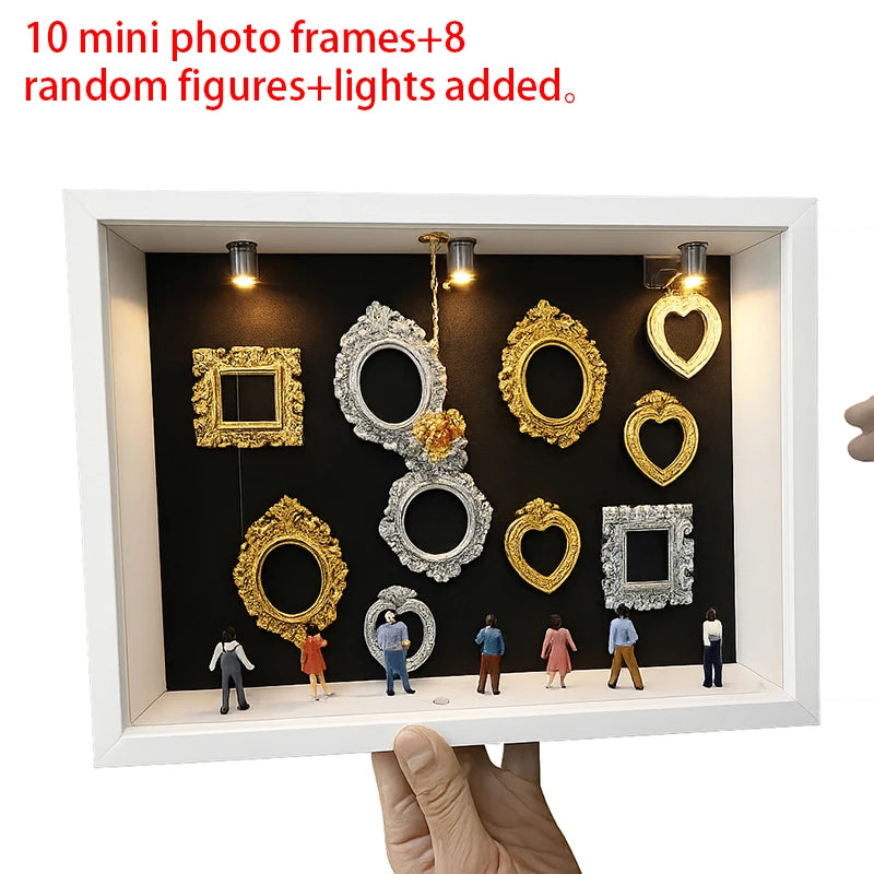 Präsentationsbox mit zehn Mini-Fotoframes, acht zufälligen Figuren und Lichtern