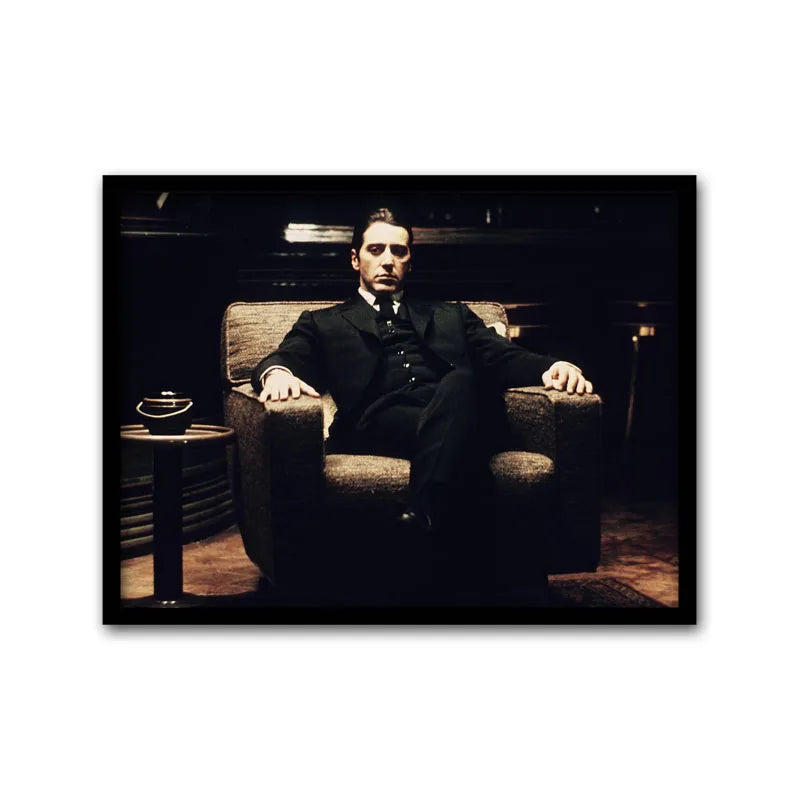 Black and white canvas wall art featuring a portrait of a man in a suit sitting in an armchair.