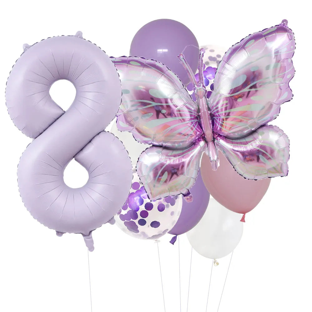 A set of purple foil balloons shaped like the number eight and a butterfly