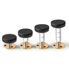 A set of black and silver adjustable bed stabilizers with round tops and brass bases.