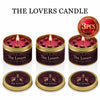 Three jars of The Lovers candle in gold packaging with red wax and dried petals.