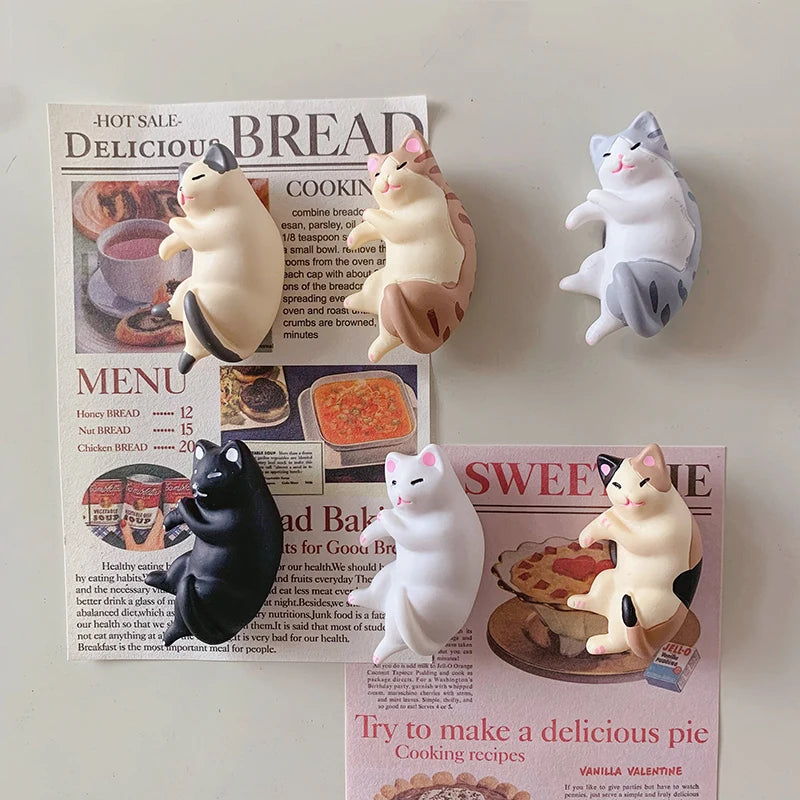 A set of six cat fridge magnets featuring various cats in different poses and colors.