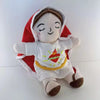 A religious plush doll depicting Jesus and the Virgin Mary, dressed in white robes with a red hood.