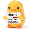 Handmade yellow knitted duck plush toy with an inspirational card that says Bestie I duck love you