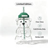 A clear glass bear-shaped coffee cup with a green lid, presented as a limited edition gift.
