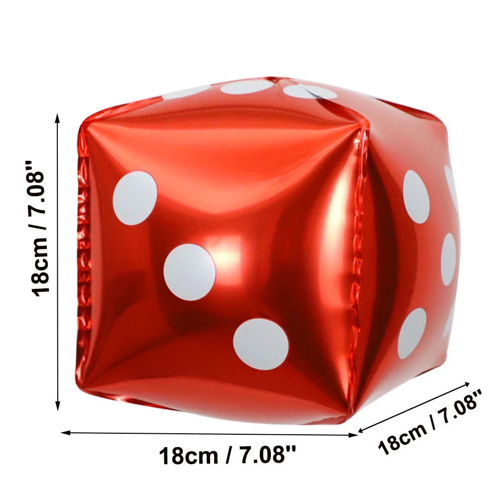 A glossy red foil balloon shaped like a die with white polka dots.
