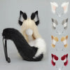 A faux fur fox tail and ear costume set featuring black and white fur accents.