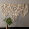 Handwoven boho macrame wall hanging tapestry with fringe in natural beige color