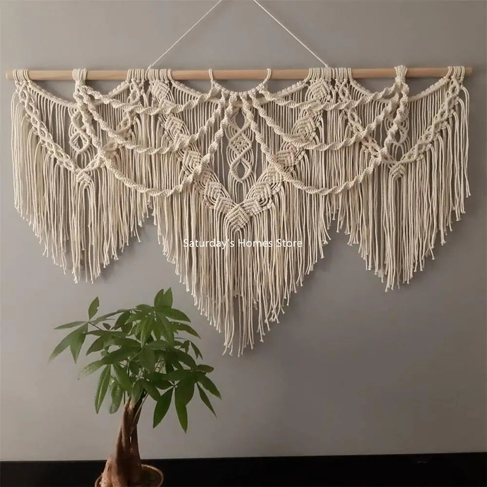 Handwoven boho macrame wall hanging tapestry with fringe in natural beige color