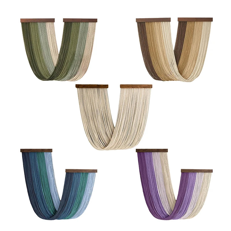 A collection of five vertical macrame wall tapestries in various shades of green, beige, and purple.