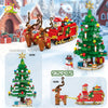 Building blocks set featuring Santa, Christmas tree, and train models in red and green colors