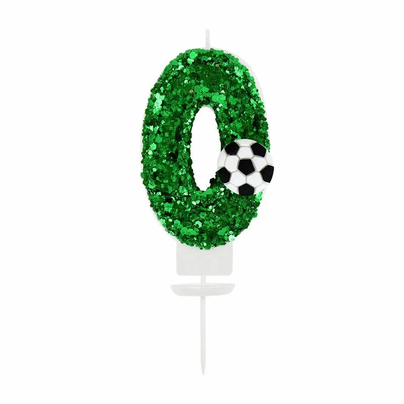 Green glitter wreath shaped like the number zero with a soccer ball detail for a birthday candle