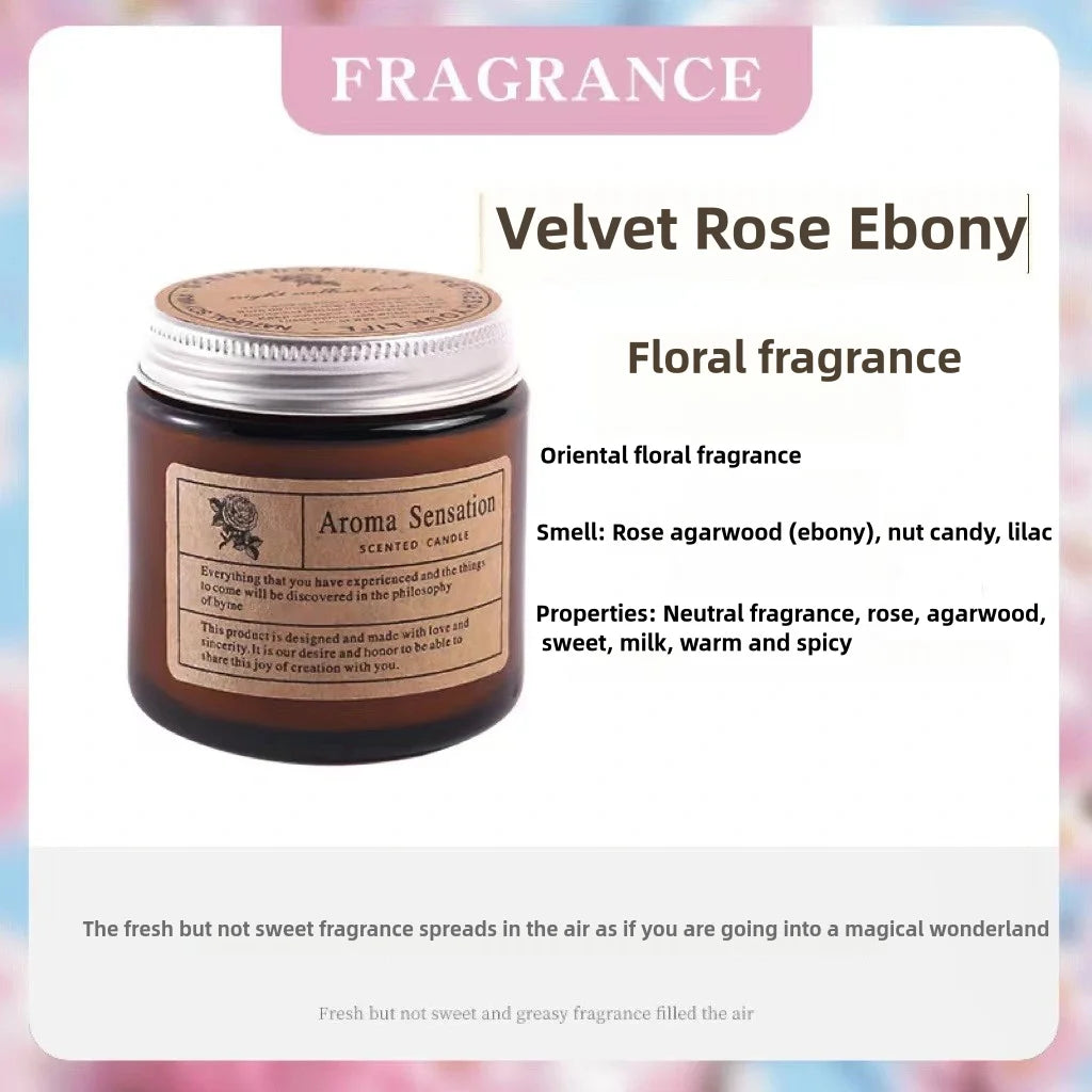 A jar of Velvet Rose Ebony floral fragrance candle with a silver lid and label