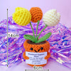 Handmade crochet potato doll with yellow and orange flowers and an inspirational card