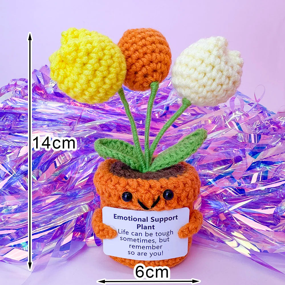 Handmade crochet potato doll with yellow and orange flowers and an inspirational card
