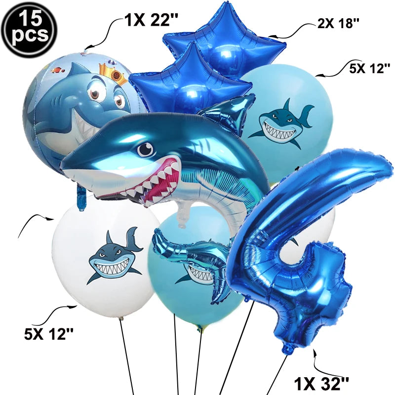 A set of blue shark foil balloons in various sizes including 18 inch, 22 inch, and a 32 inch number balloon for an ocean-them