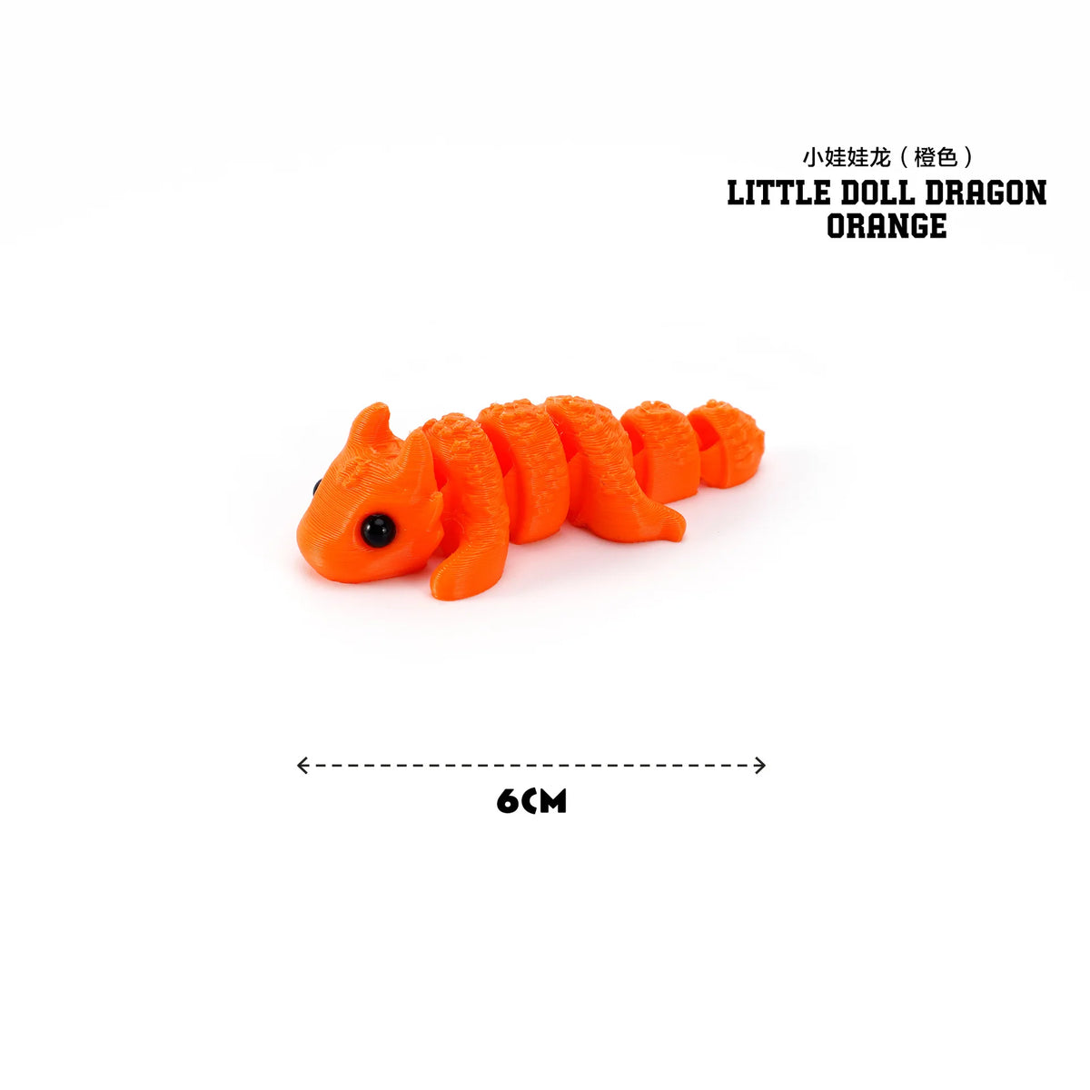 Orange little dragon figurine with a black eye, shown horizontally.