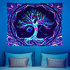 A vibrant tapestry featuring a glowing tree of life against a cosmic galaxy background.