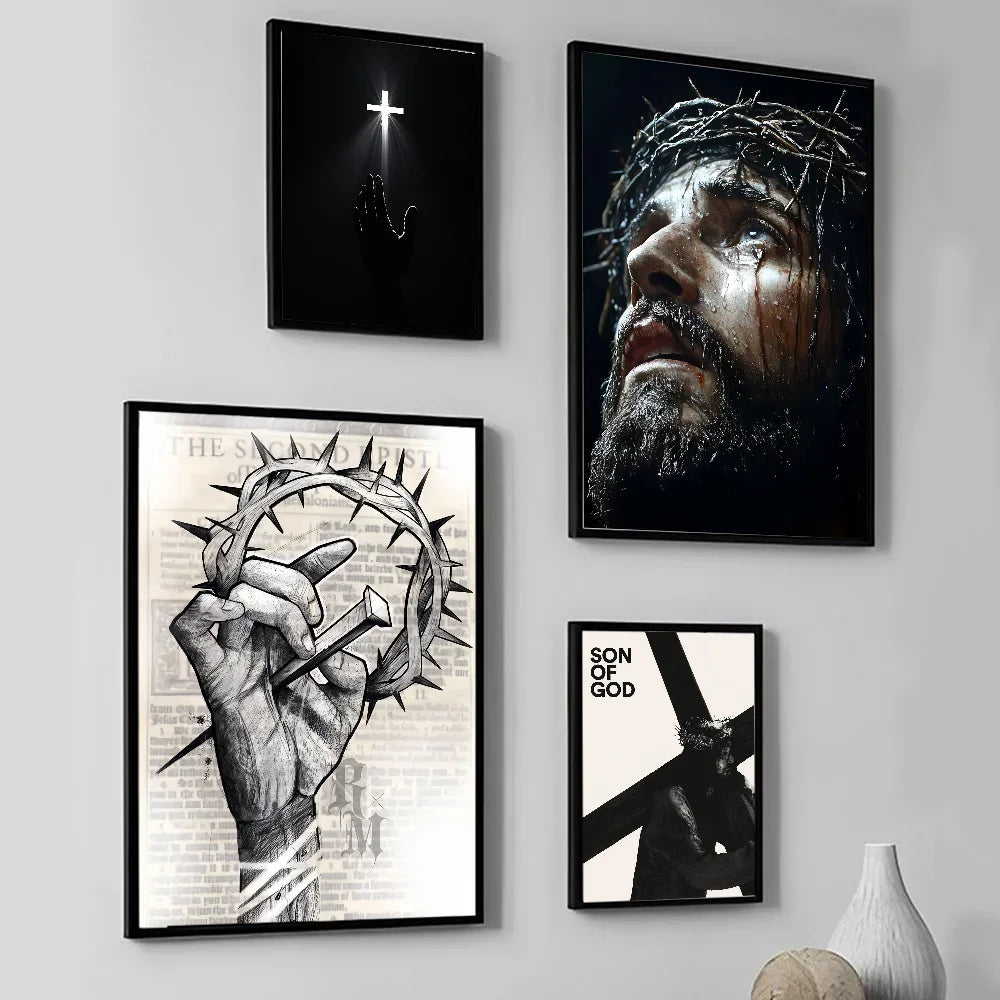 A collection of four framed wall art prints featuring religious themes, including a cross, Jesus's face, and a hand holding t
