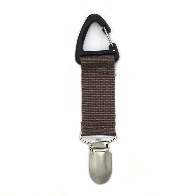 A black portable straw hat clip with a brown woven strap and a silver metal hook.