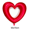 A red heart-shaped balloon with a foil finish.
