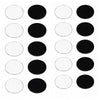 A set of twelve round acrylic fridge magnets in clear and black finishes.