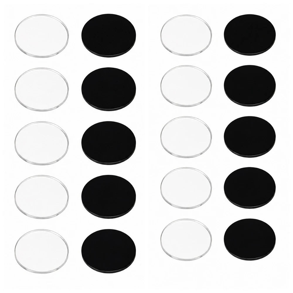 A set of twelve round acrylic fridge magnets in clear and black finishes.