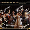 LED ribbon fairy wands with glowing ribbons and bells used for wedding celebration.