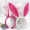 Pink and white bunny ear headbands displayed in a white frame.