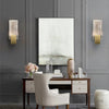 Modern bubble crystal LED wall sconces mounted on a gray wall above a wooden desk.