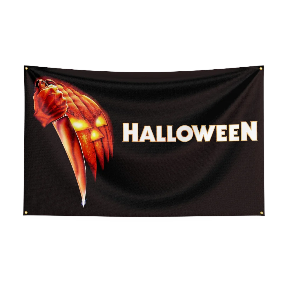 A black flag with the word HALLOWEEN in white text and a carved pumpkin design.