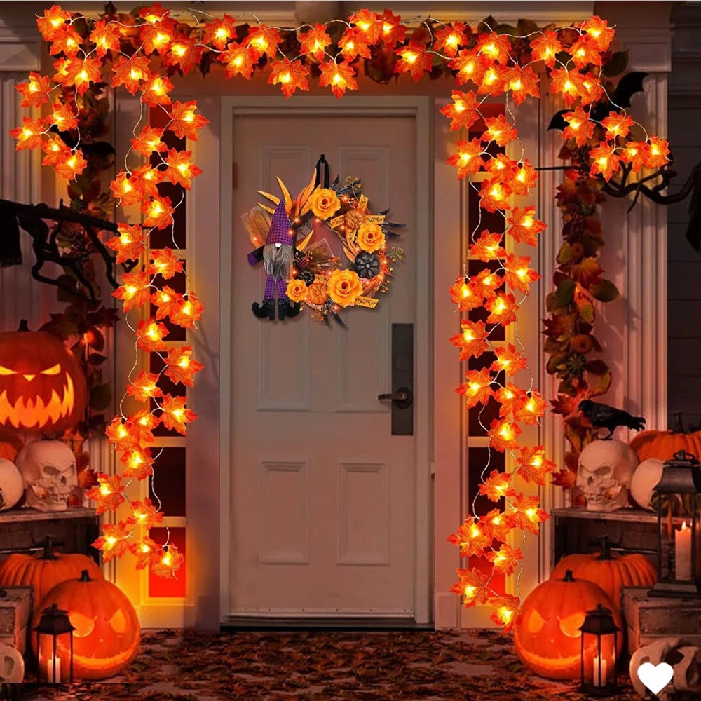 An orange decorative LED string lights garland frames a white door for Halloween decoration.