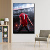 A canvas wall art poster depicting Cristiano Ronaldo in a red jersey during a football match.